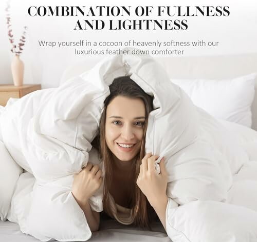 Woman wrapped in a luxurious feather down comforter, smiling.