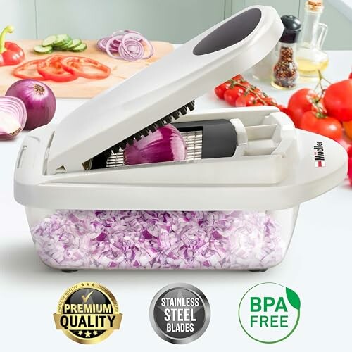 Vegetable chopper with chopped onions and fresh ingredients.